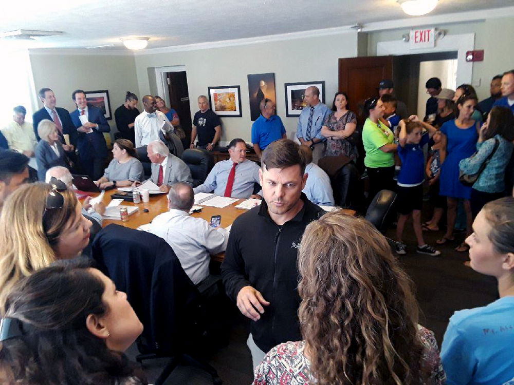 A crowded county caucus Tuesday